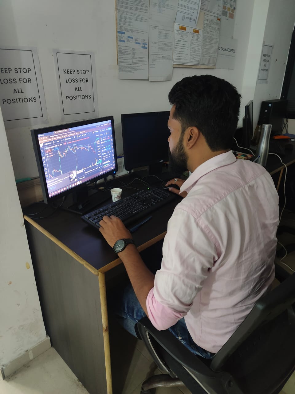 Student analysing charts in the Market Credo classroom